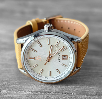 Meshberg 37 Automatic Champagne Mist with warm cream dial, tan leather strap, and polished stainless steel case